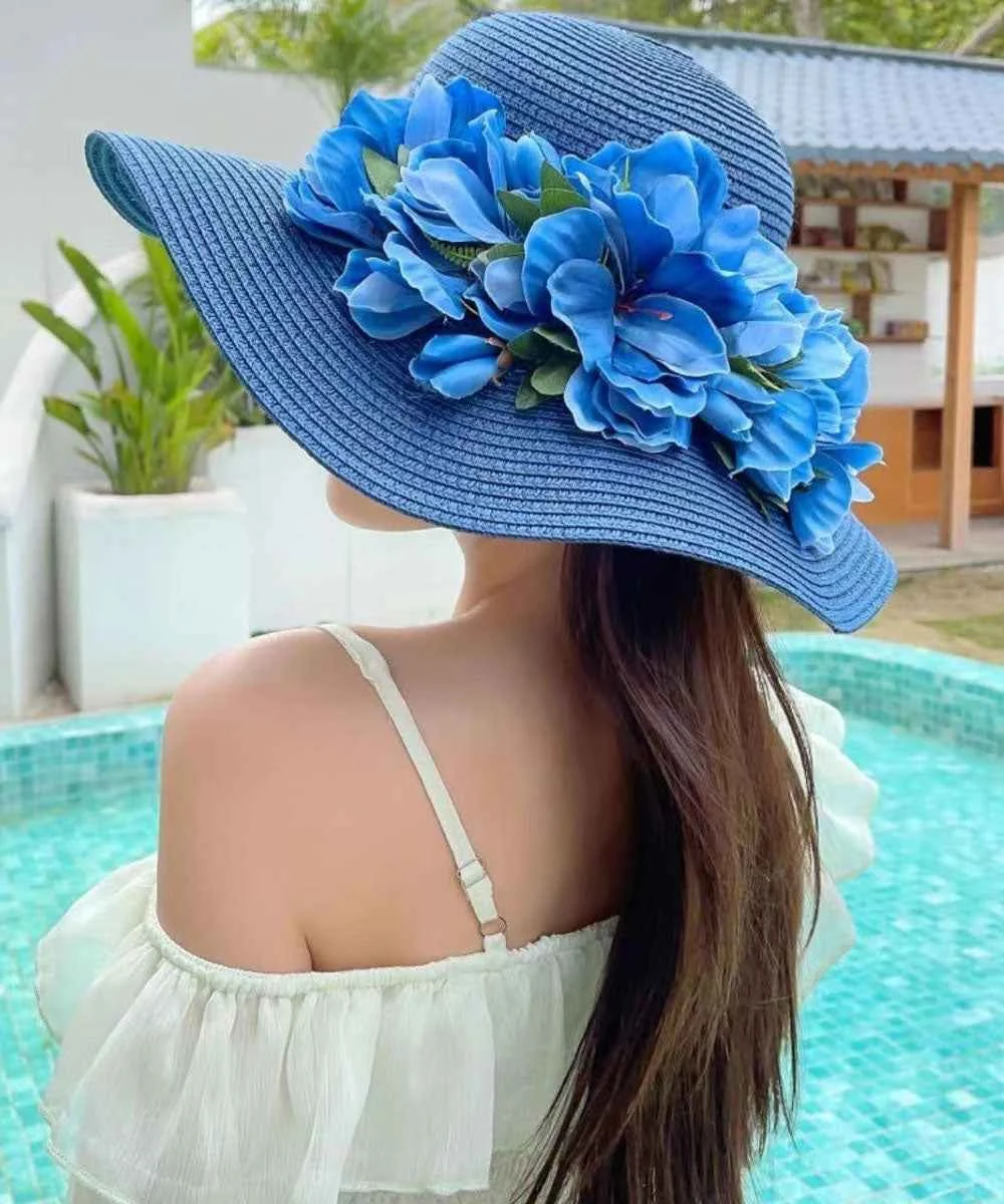 Boutique Blue Floral Straw Woven Holiday Sun Hat - Woolova